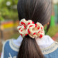 Red Heart and white scrunchy