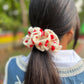 Red Heart and white scrunchy