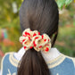 Red Heart and white scrunchy
