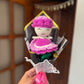 Rose doll purple
